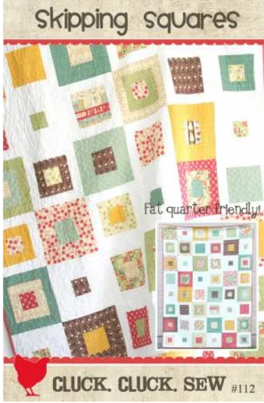 Tim Holtz orange palette quilt kit including the Skipping Squares pattern - 51" x 68"